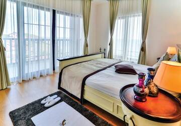 Фото номера Семейный люкс Курортные отели Thracian Cliffs Golf &amp; Beach Resort г. Каварна 5