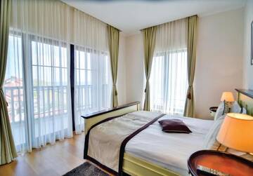 Фото номера Семейный люкс Курортные отели Thracian Cliffs Golf &amp; Beach Resort г. Каварна 9