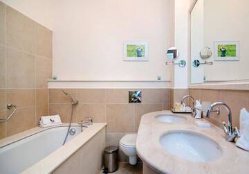 Фото номера Семейный люкс Курортные отели Thracian Cliffs Golf &amp; Beach Resort г. Каварна 7