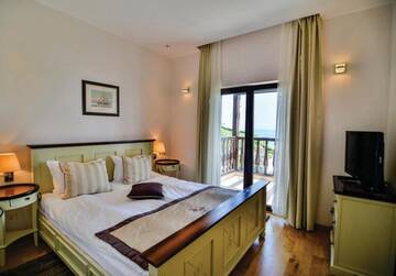 Фото номера Семейный люкс Курортные отели Thracian Cliffs Golf &amp; Beach Resort г. Каварна 9