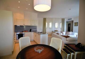 Фото номера Семейный люкс Курортные отели Thracian Cliffs Golf &amp; Beach Resort г. Каварна 10